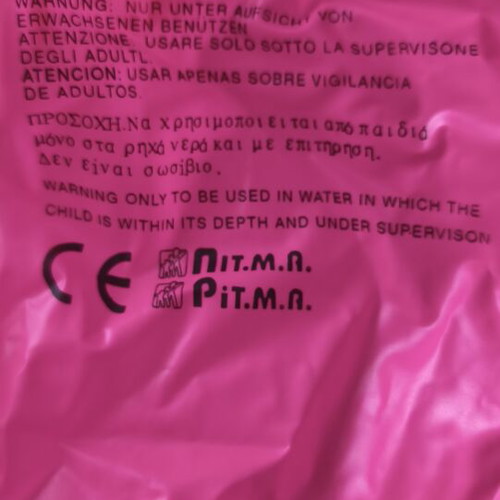 Inflatable beach ball used, pink with yellow dots, 40 cm diameter