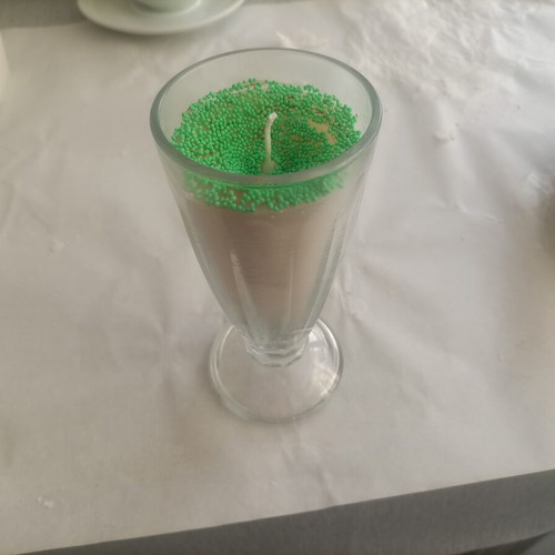 Candle new in glass holder