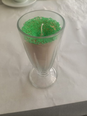 Candle new in glass holder