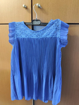 Women's blue blouse size medium/large like new
