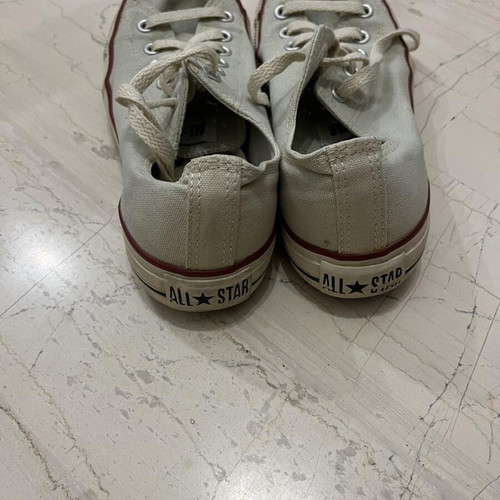 All Star Converse low sneakers used in gray color