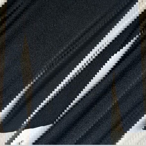 Reserved black dress like new with long sleeves and draping, size M