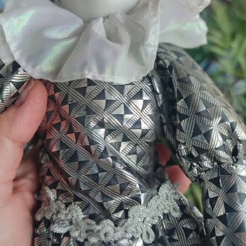 Porcelain Harlequin doll