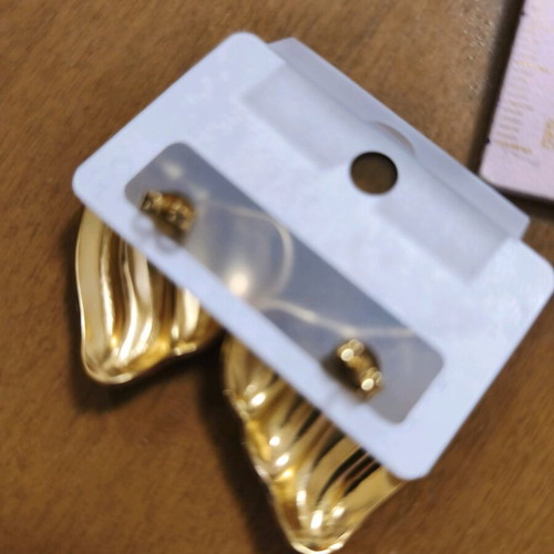 Heart-shaped clip-on earrings new, gold color with embossed design