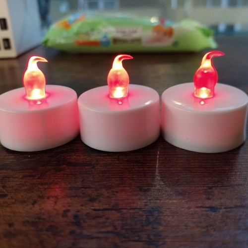 Battery-operated tealight candles, set of three, like new