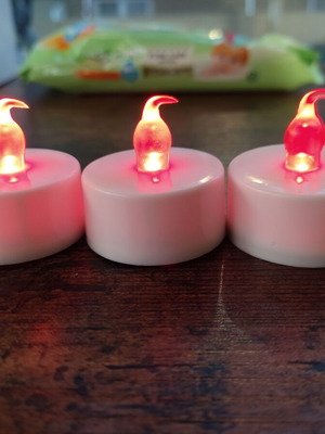 Battery-operated tealight candles, set of three, like new