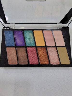 Eyeshadow palette slightly used with brush