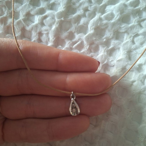 Drop necklace with beige cord and silver tear pendant like new