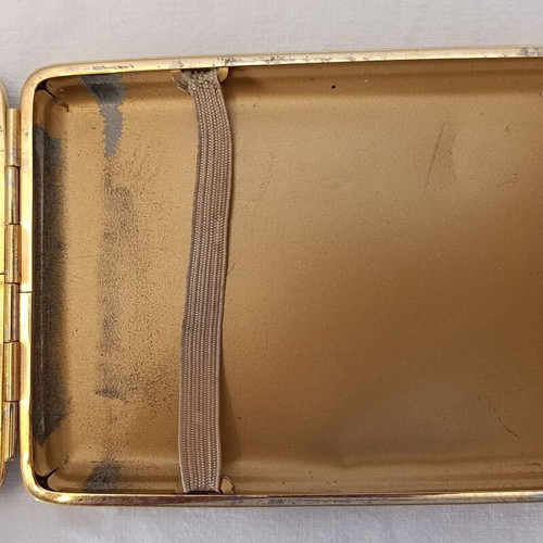 Classic cigarette case used, black leatherette with bronze interior