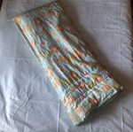 Single quilt used with two sides, floral and blue