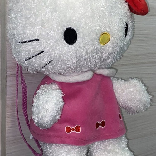 Hello Kitty backpack like new, white and pink