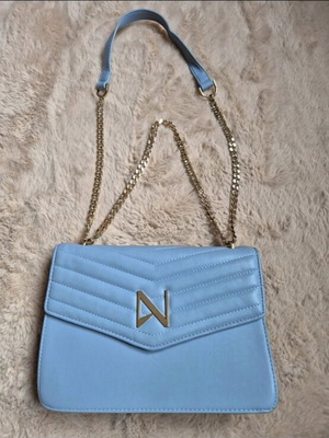 Nolah bag blue like new, barely worn