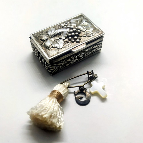 Old silver-plated pill box with embossed decoration like new