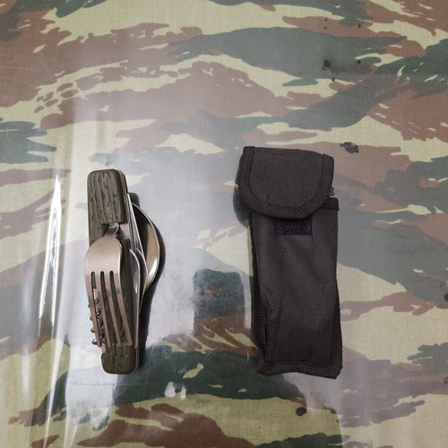 Camping multi-tool with case used