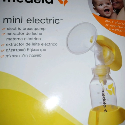 Medela mini electric electric breast pump used with two pumps and chargers