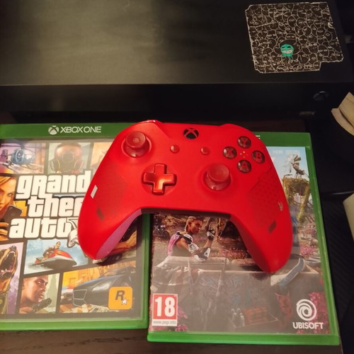 Xbox One console like new with 1TB storage and extra black controller