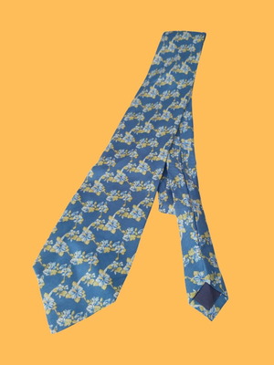 Nina Ricci tie used, floral pattern in turquoise and yellow