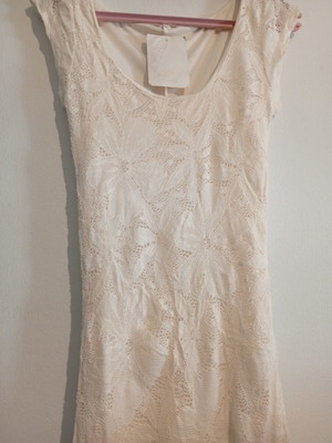 Embroidered dress size small new with half lining