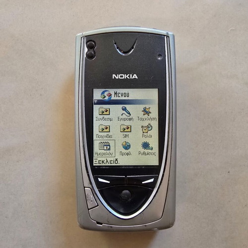 Nokia 7650 cell phone used, silver