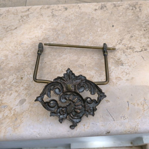 Bronze toilet paper holder used