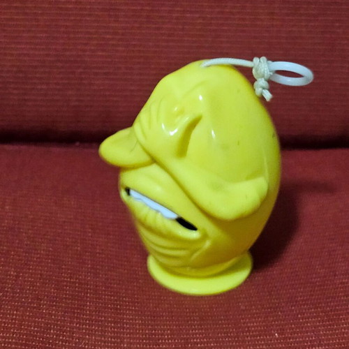 Wind-up figure used that vibrates