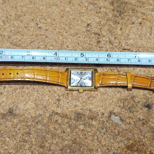 Casio women's watch used with brown leather strap