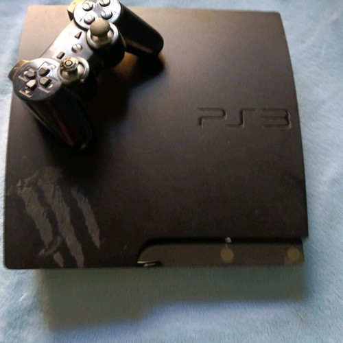 PlayStation 3 (PS3) like new with cable, controller and Assassin's Creed II