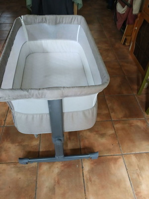 Baby cot like new with adjustable height