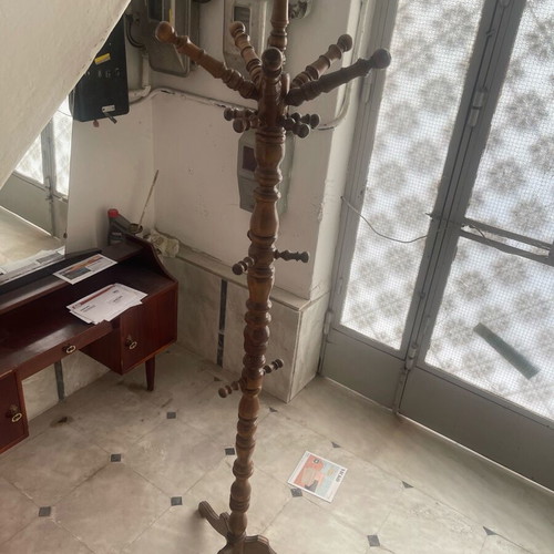 Coat rack used, stands very well