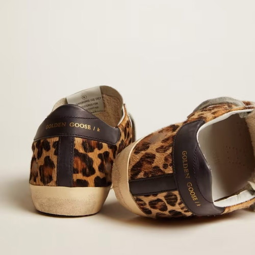 Golden Goose women's shoe with leopard print and black star