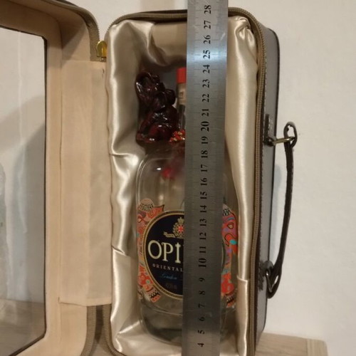 Collectible bottle in leather case like new