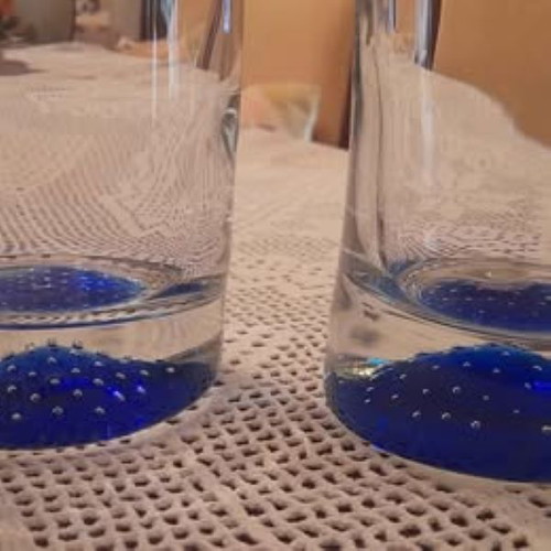 Glass vases with blue base set of two and small vase like new