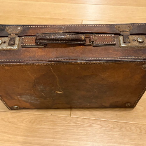 English vintage leather suitcase used with patina
