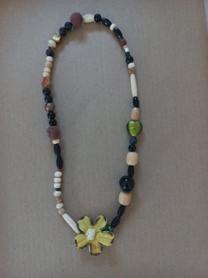 Boho necklace handmade with yellow fabric flower and mixed earthy beads