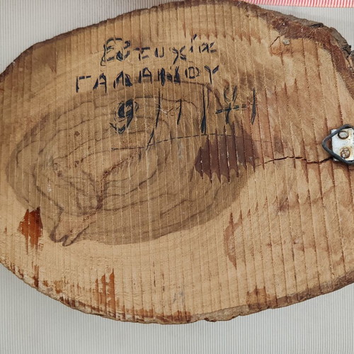 Vintage wall crucifix made of olive wood with Holy Land soil and dedication