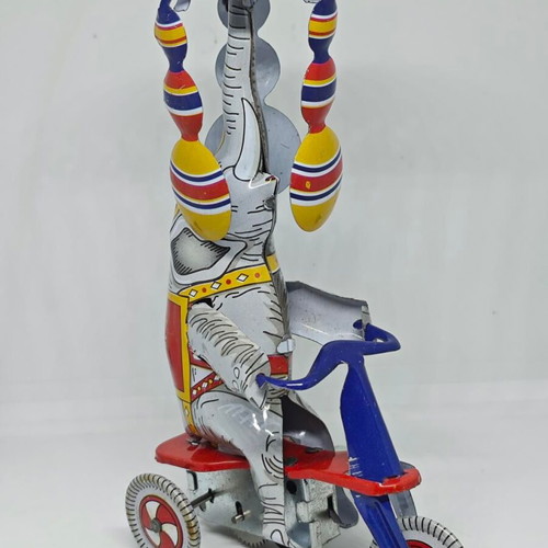 Vintage metal elephant on tricycle like new