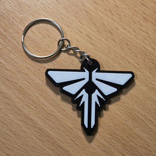 Fireflies keychain new, black and white