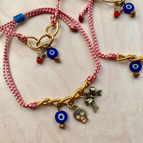 Pack of 4 new Martakia with blue eye and metallic gold bronze details