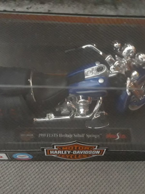 Harley Davidson 1999 FLSTS Heritage Springer син 1:18 мащаб
