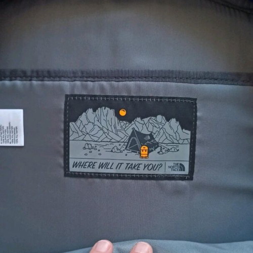 The North Face backpack brand new, black and blue