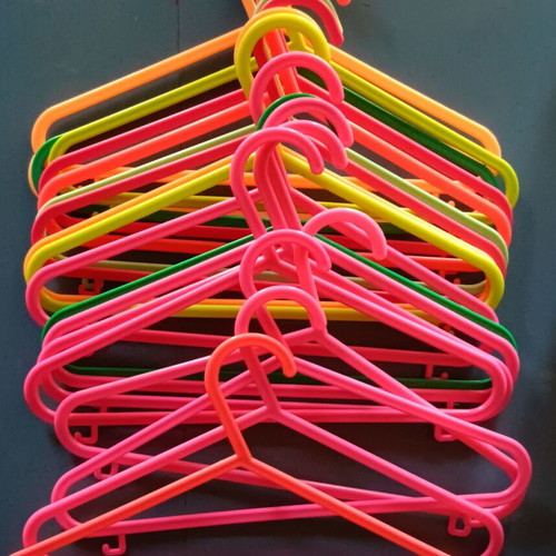 Set of 19 plastic children's hangers like new, multicolored
