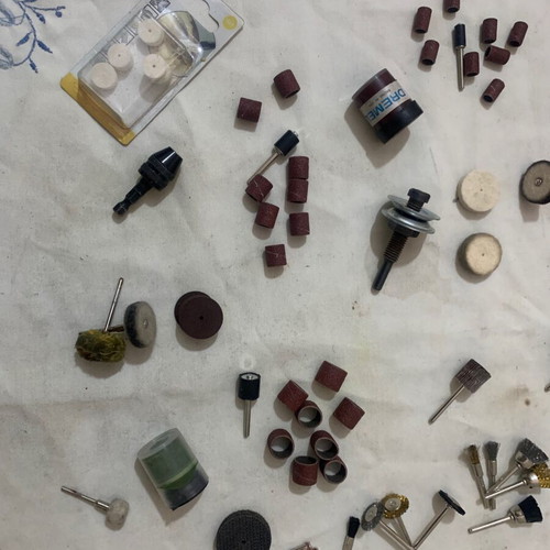 Dremel accessory set used for sanding, cutting, grinding, and polishing