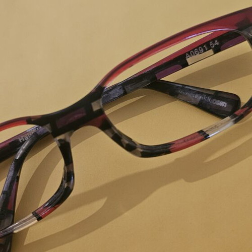 Alain Mikli eyeglass frame used, black and red