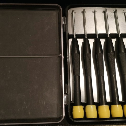 Set of small precision screwdrivers like new in case