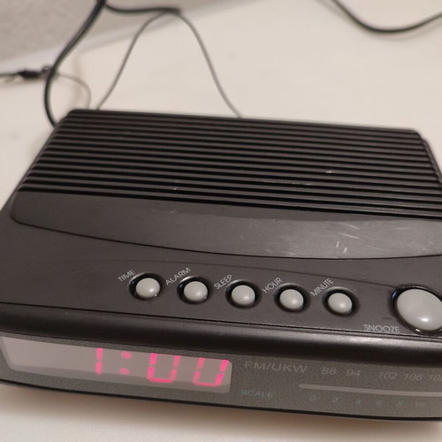 Radio alarm clock used, fully functional with some scratches