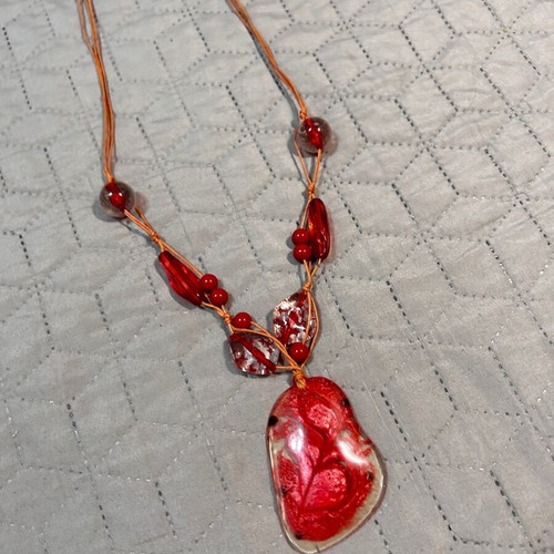 Necklace with red stones like new