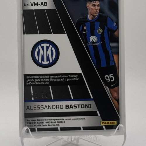 2023-24 Obsidian Alessandro Bastoni Volcanic Material Jersey Orange Auto card