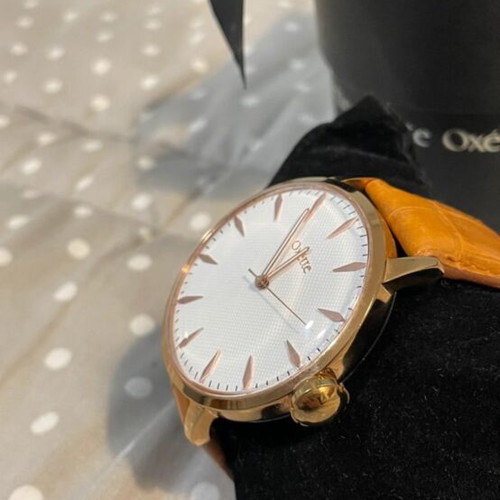 Oxette wristwatch used, brown leather strap, gold details