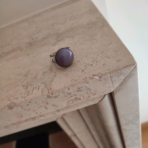Faux ring with purple stone used, adjustable size