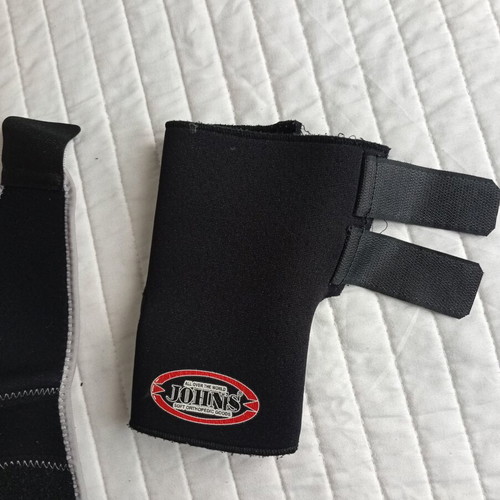 Sensiplast knee brace and John's left wrist orthopaedic splint